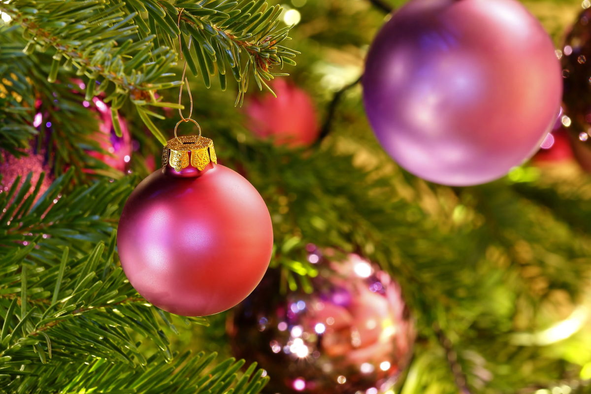 close up of decorated Christmas tree with pink baubles