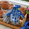 Burgon & Ball British Meadow Collection gloves with terracotta pots and wooden tray