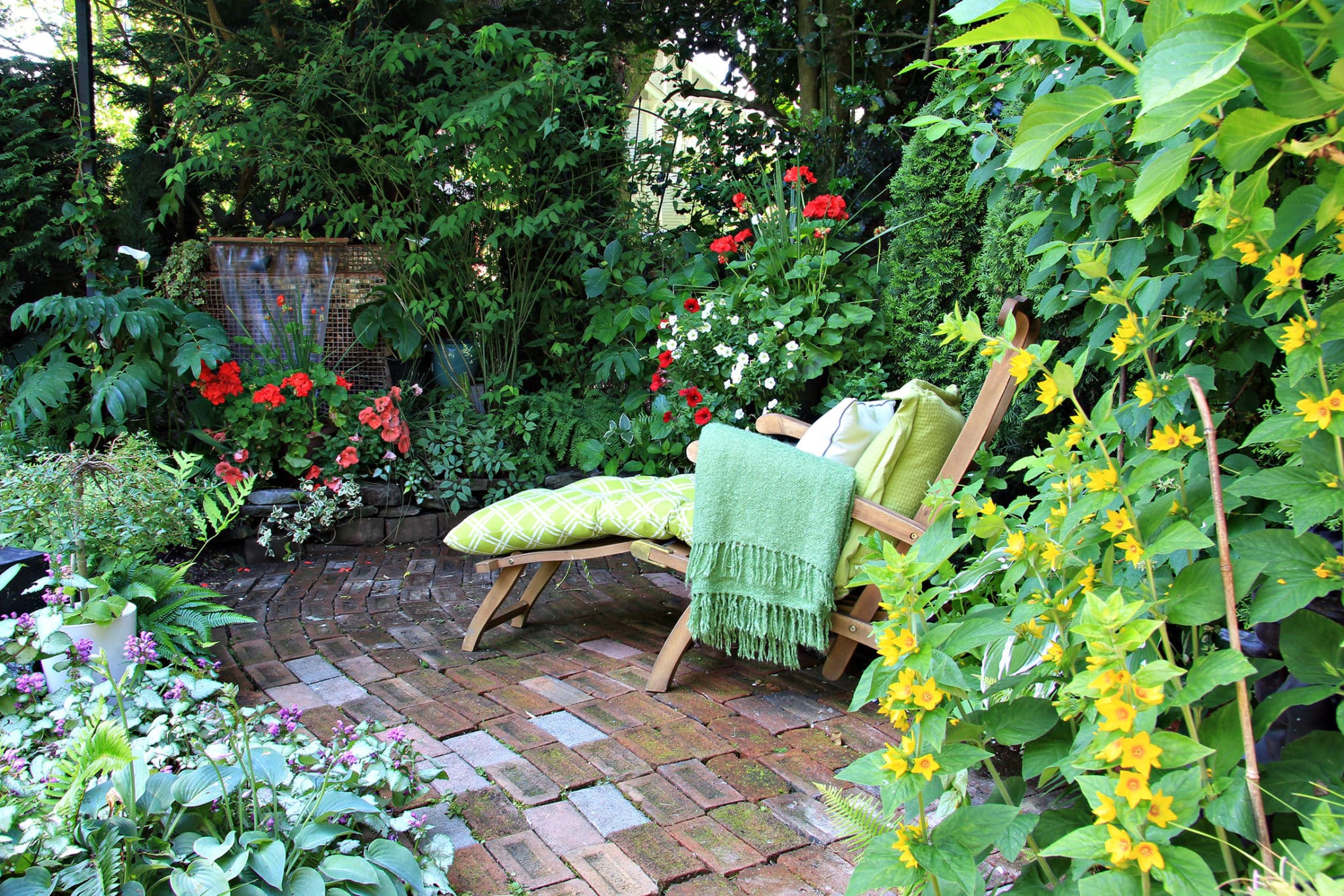 Cosy chair in corner of the garden