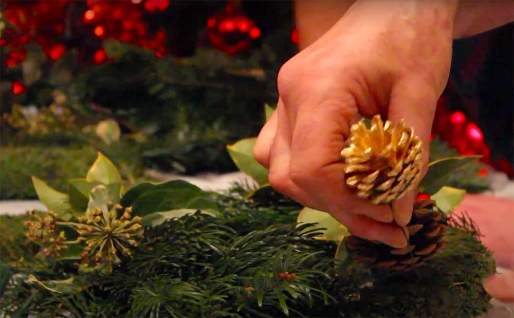 Geoff Stonebanks making a Christmas wreath