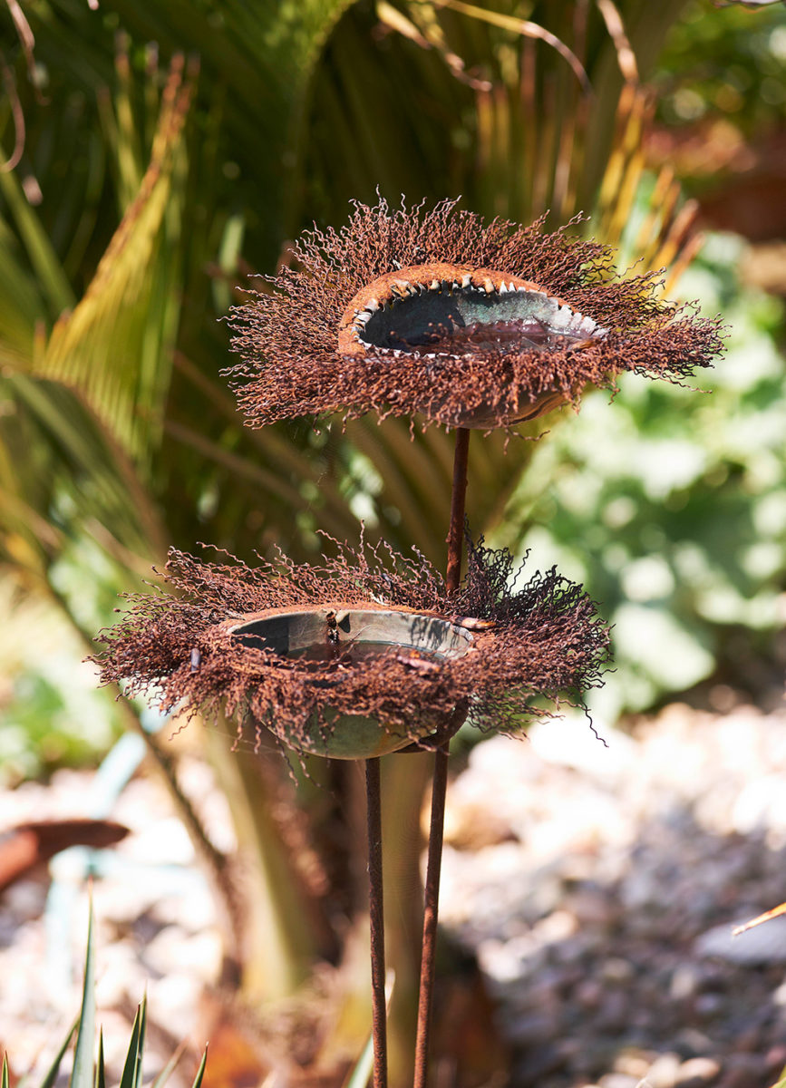 sculpture used as a birdbath at Driftwood