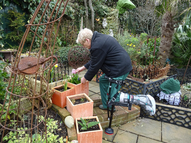 Geoff Stonebanks gardening after tearing his achilles tendon in 2020