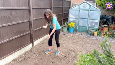 Debi Holland scattering flower seeds