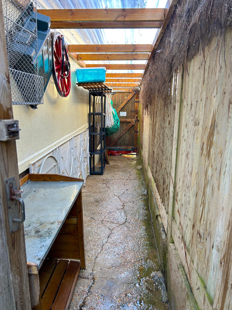 The side alley of the house at Driftwood Garden
